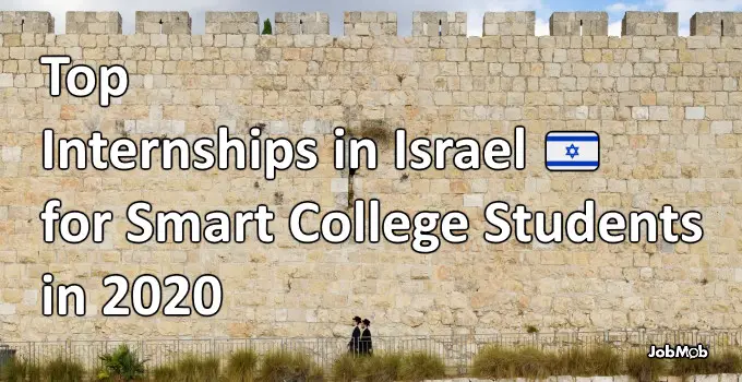 Two ultra-Orthodox Jews walking past the Old City walls of Jerusalem