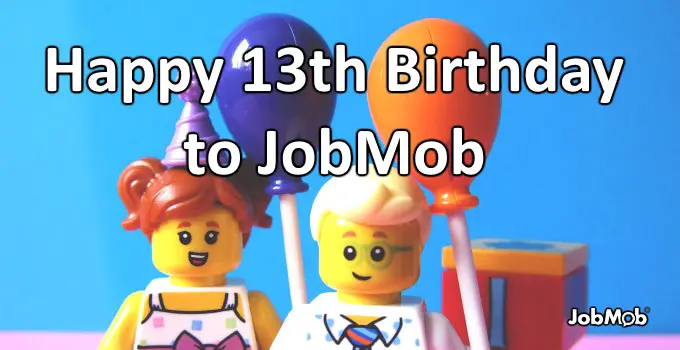 Lego girl and boy holding birthday balloons